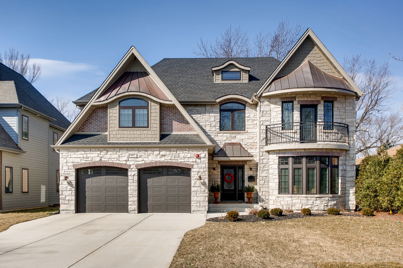 a front view of a house with a yard
