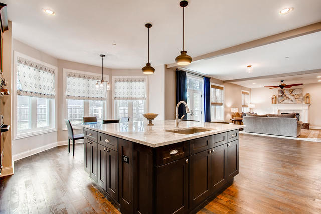 462 Northgate Court Riverside, IL 60546 - Photo 11 of 36 a kitchen with stainless steel appliances granite countertop a sink a stove and wooden floor