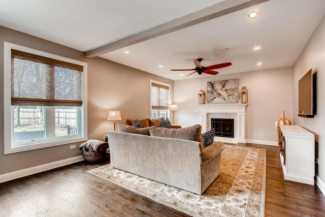 462 Northgate Court Riverside, IL 60546 - Photo 14 of 36 a living room with furniture a fireplace and a flat screen tv