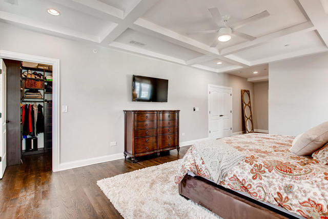 462 Northgate Court Riverside, IL 60546 - Photo 18 of 36 a bedroom with a bed and a television