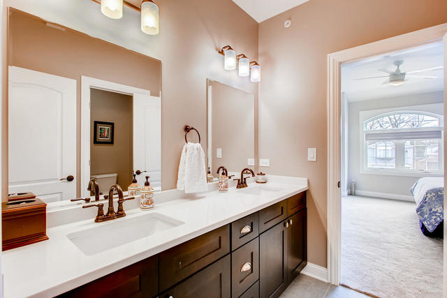 462 Northgate Court Riverside, IL 60546 - Photo 25 of 36 a en suite bathroom with a double vanity sink and a mirror