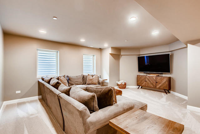 462 Northgate Court Riverside, IL 60546 - Photo 26 of 36 a living room with furniture and a flat screen tv
