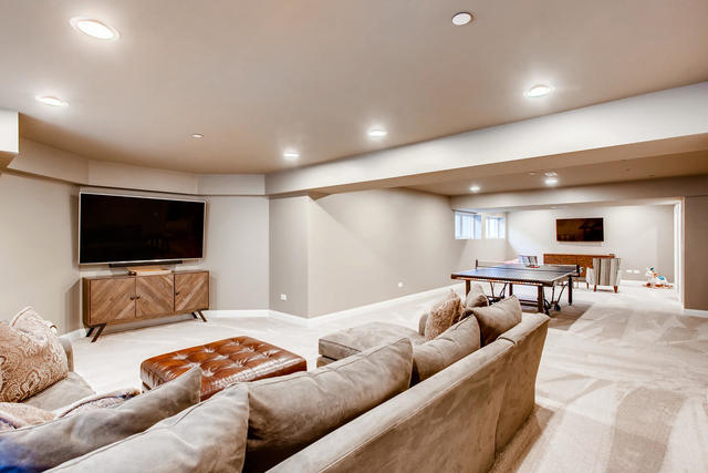 462 Northgate Court Riverside, IL 60546 - Photo 27 of 36 a living room with furniture and a flat screen tv