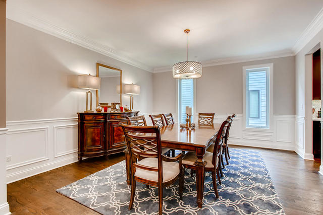 462 Northgate Court Riverside, IL 60546 - Photo 6 of 36 a view of a dining room with furniture and wooden floor