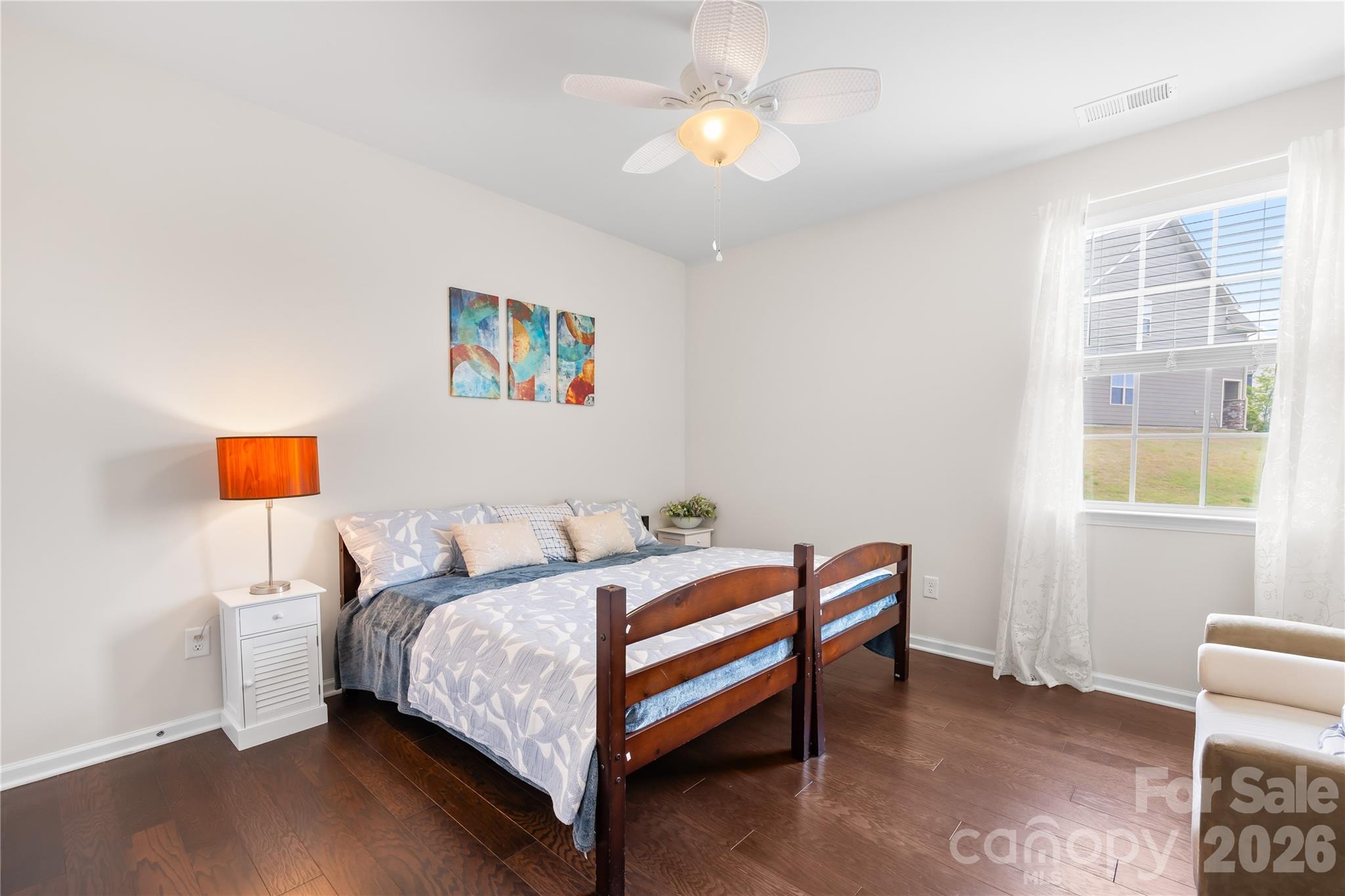 1741 Wildwood Terrace Trail Fort Mill, SC 29708 - Photo 20 of 47 a bedroom with a bed and a window