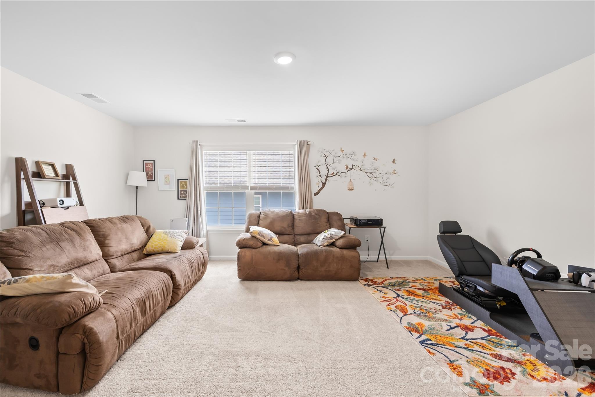 1741 Wildwood Terrace Trail Fort Mill, SC 29708 - Photo 23 of 47 a living room with furniture a window and a rug