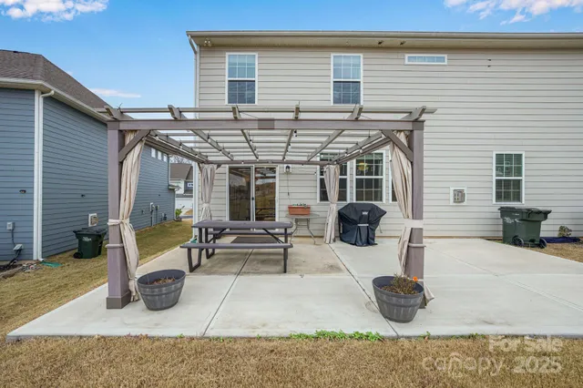 a view of a house with patio