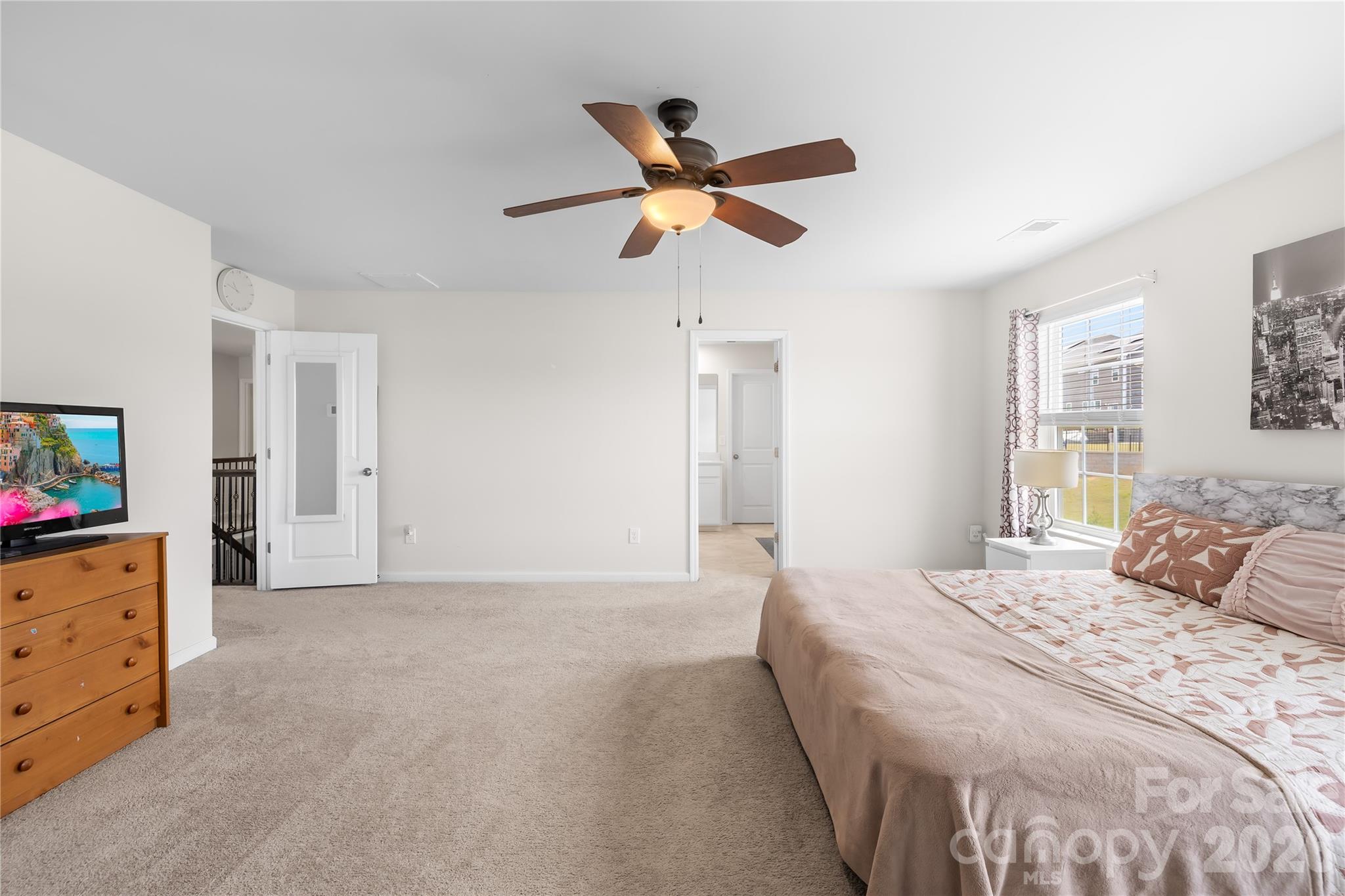 1741 Wildwood Terrace Trail Fort Mill, SC 29708 - Photo 27 of 47 a bedroom with a bed and window