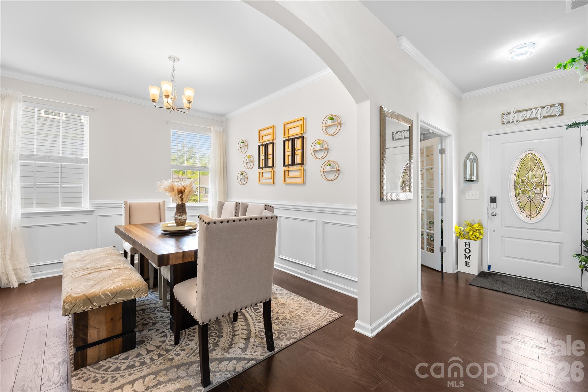 1741 Wildwood Terrace Trail Fort Mill, SC 29708 - Photo 5 of 47 a living room with furniture a chandelier and a window