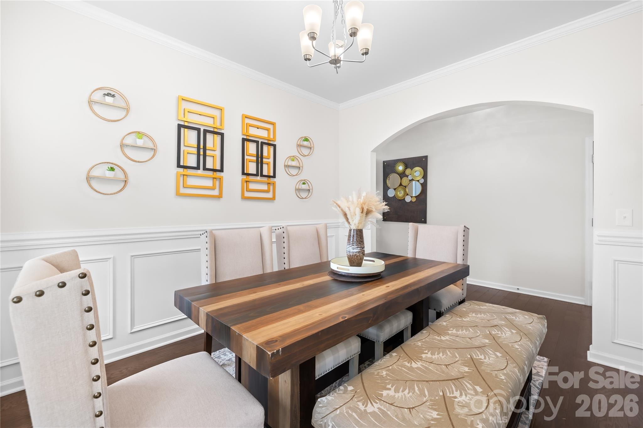 1741 Wildwood Terrace Trail Fort Mill, SC 29708 - Photo 6 of 47 a living room with furniture and paintings on the wall