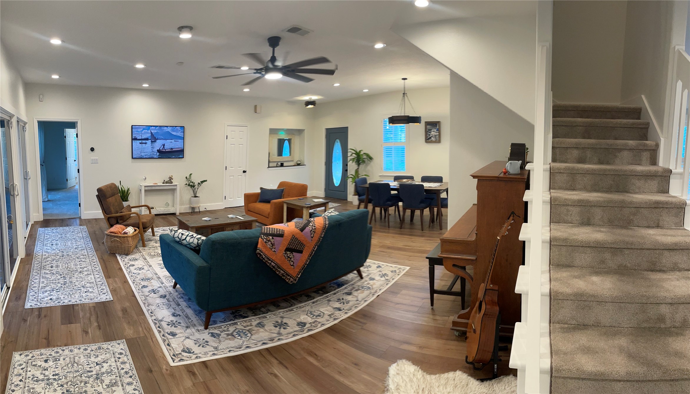 5 Maystar Court Spring, TX 77380 - Photo 8 of 26 a living room with furniture and wooden floor