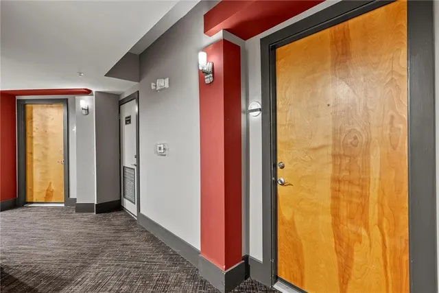 a view of a bathroom with a glass door