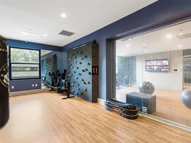 a room with furniture window and flat screen tv