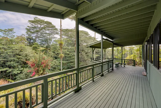 a view of balcony with wooden floor