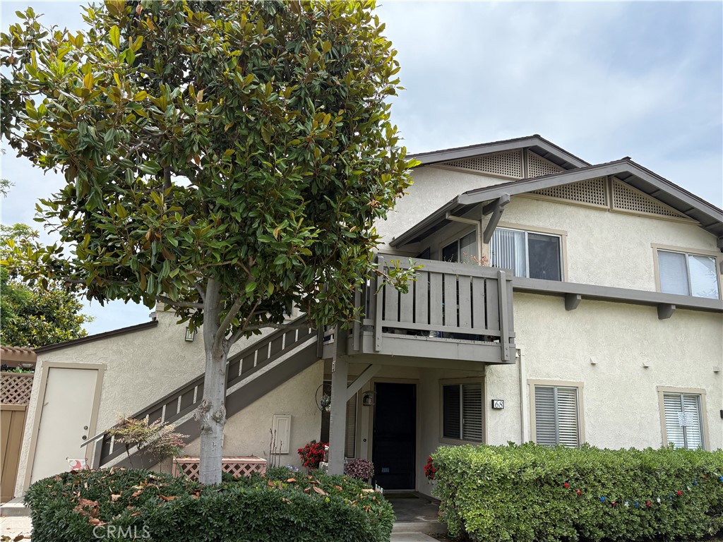 front view of a house with a small yard