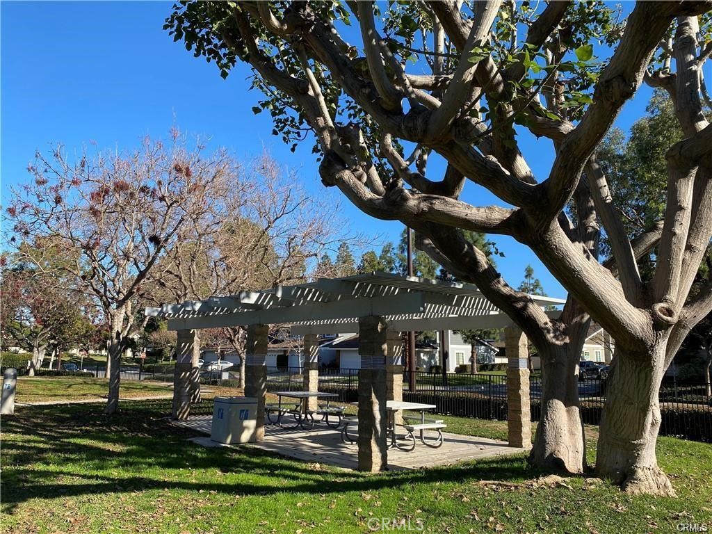 70 Echo Run, Unit 31 Irvine, CA 92614 - Photo 15 of 19 a view of house with a yard