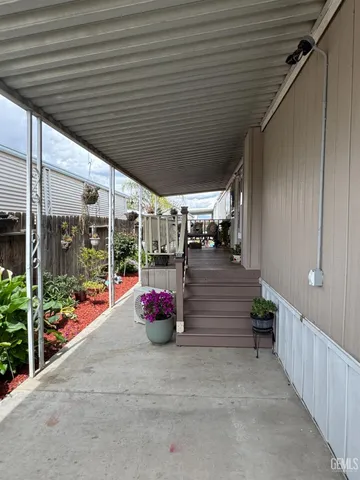 a view of outdoor space with porch and sitting area