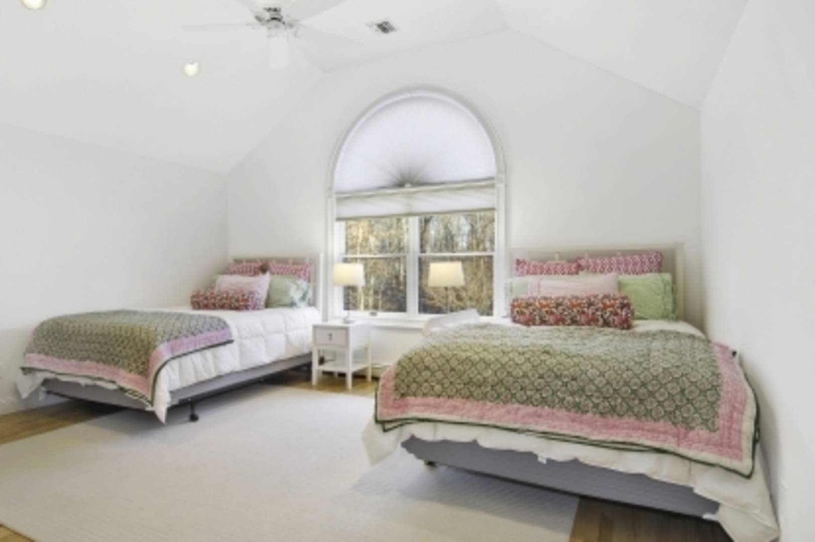 26 Cedar Trail East Hampton, NY 11937 - Photo 11 of 16 a bedroom with a bed and a window