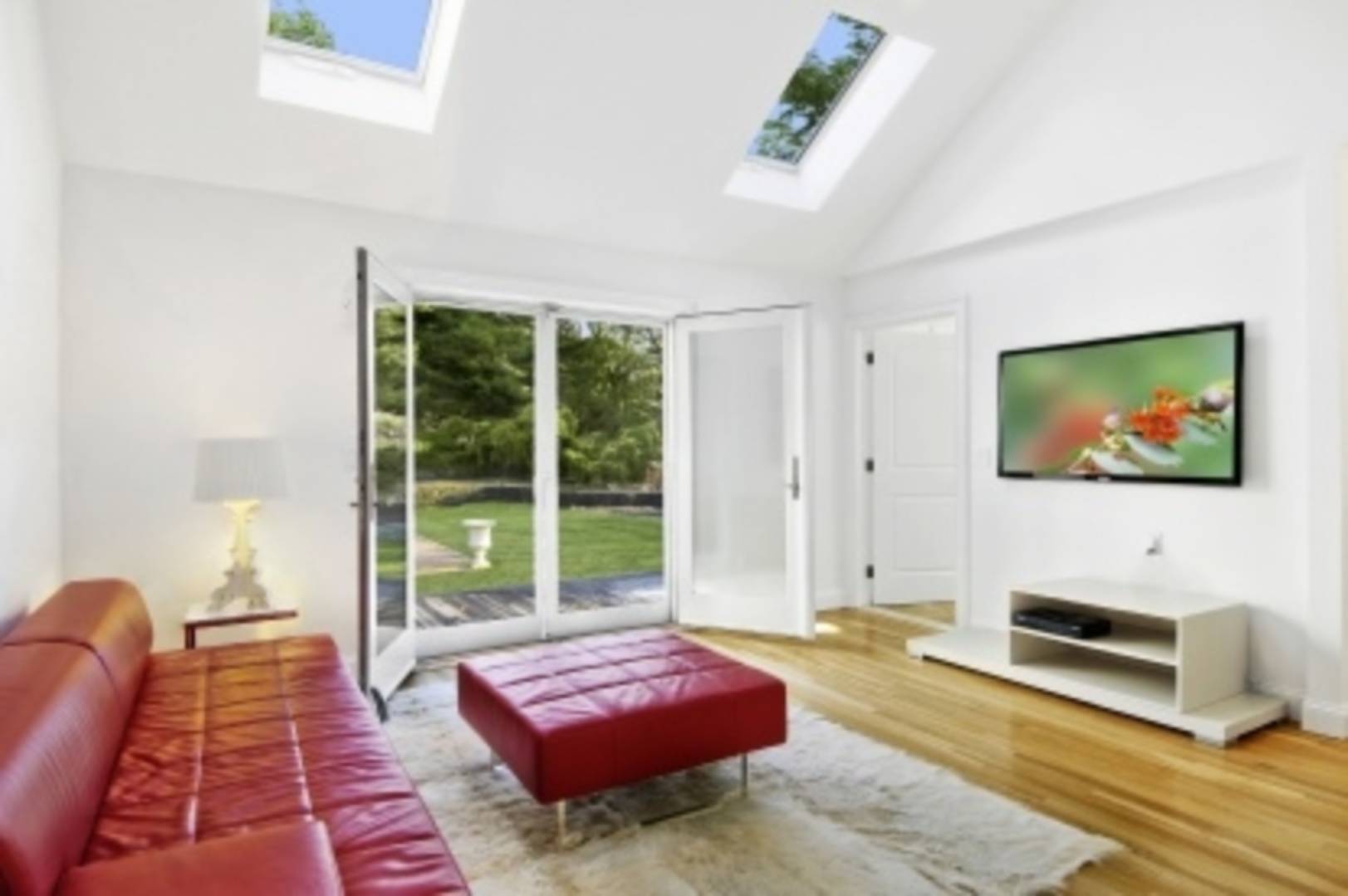 26 Cedar Trail East Hampton, NY 11937 - Photo 12 of 16 a living room with furniture and a rug