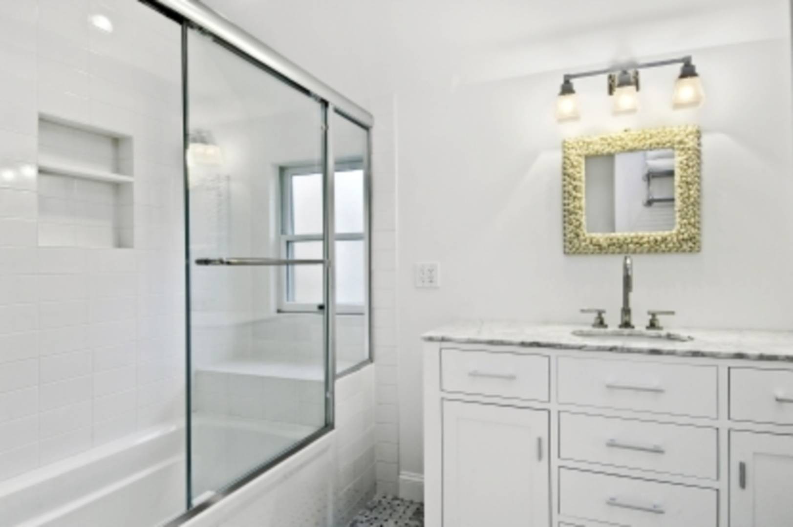 26 Cedar Trail East Hampton, NY 11937 - Photo 14 of 16 a bathroom with a sink and a mirror