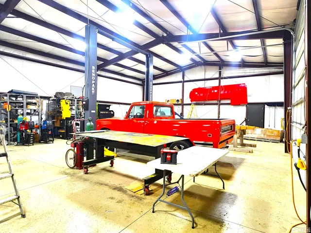 a outdoor space with lots of tables and chairs