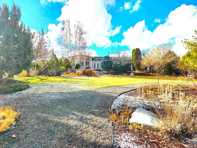 a view of a swimming pool with an outdoor space and seating area