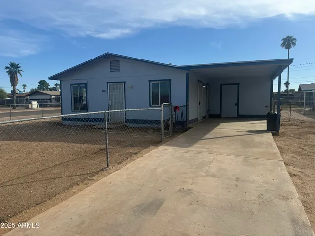 a view of hallway with window and front door