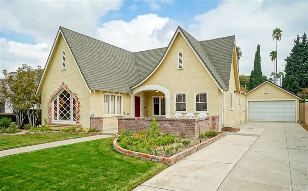 Curb appeal galore on this exquisite historic "Wood Streets" Tudor style home at 3543 Castle Reagh Place in Riverside CA 92506.