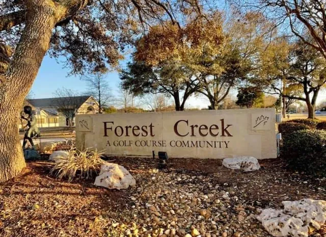 a sign broad on the side of the road