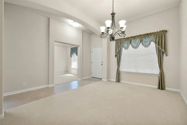 a view of a chandelier in a room