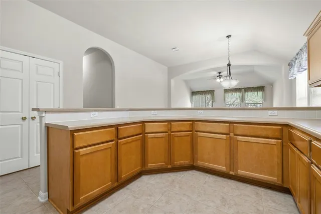 a kitchen with stainless steel appliances granite countertop cabinets and a sink