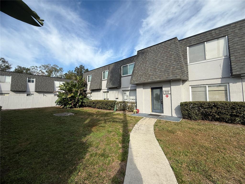 1944 South Conway Road, Unit 3 Orlando, FL 32812 - Photo 3 of 20 a front view of a house with garden
