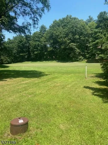 a view of a house with a big yard