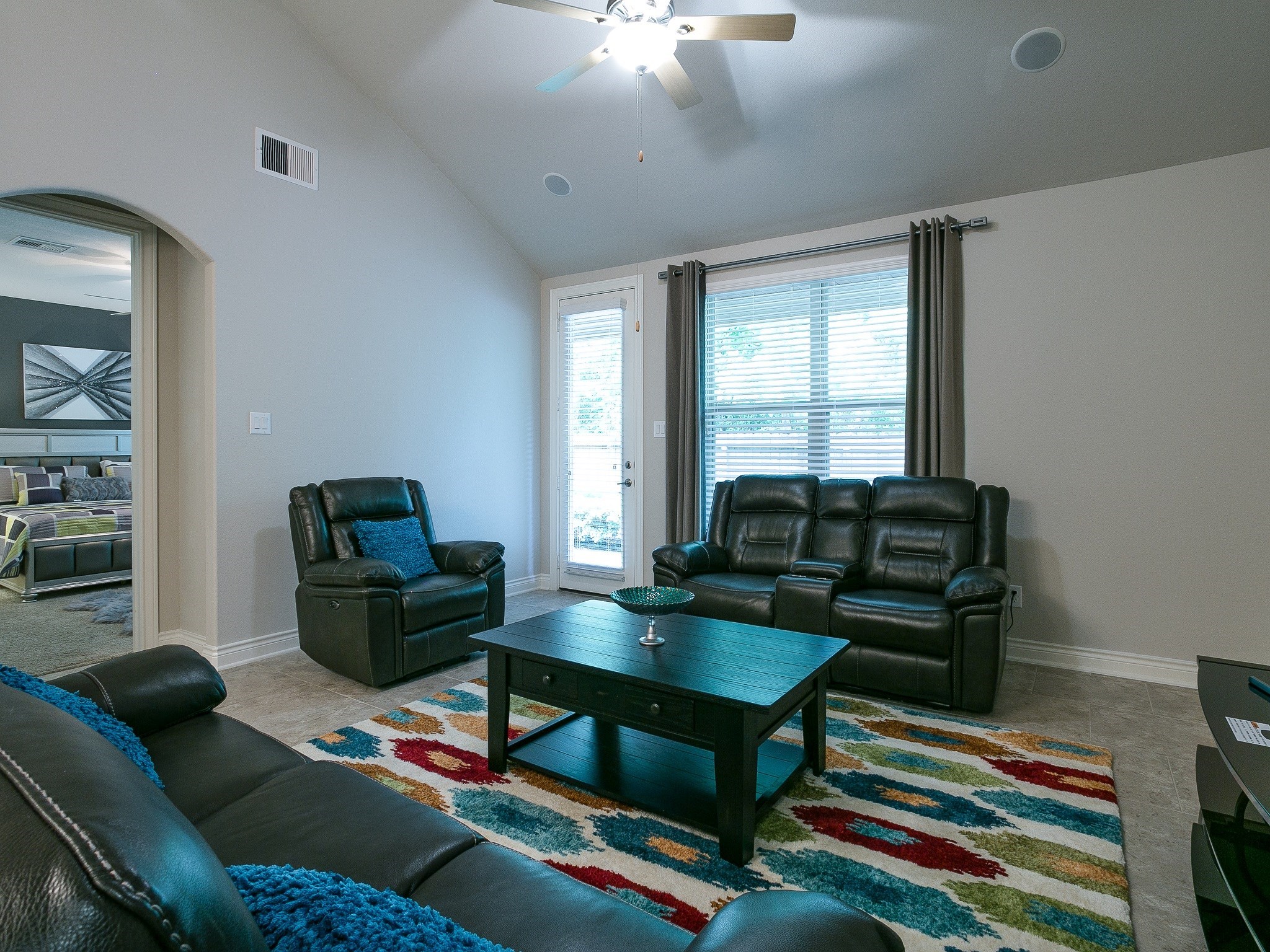 9018 Meacom Drive Conroe, TX 77384 - Photo 18 of 41 a living room with furniture and a window