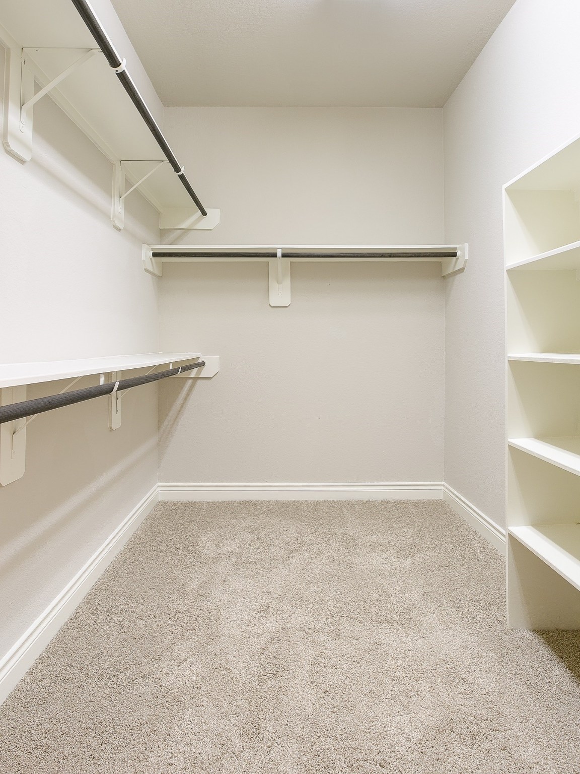 9018 Meacom Drive Conroe, TX 77384 - Photo 23 of 41 a view of a room with racks on the wall