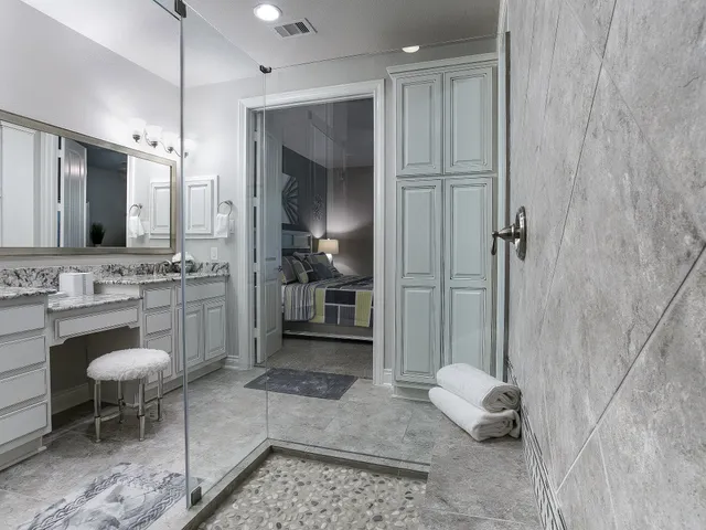a view of a kitchen with furniture and a sink