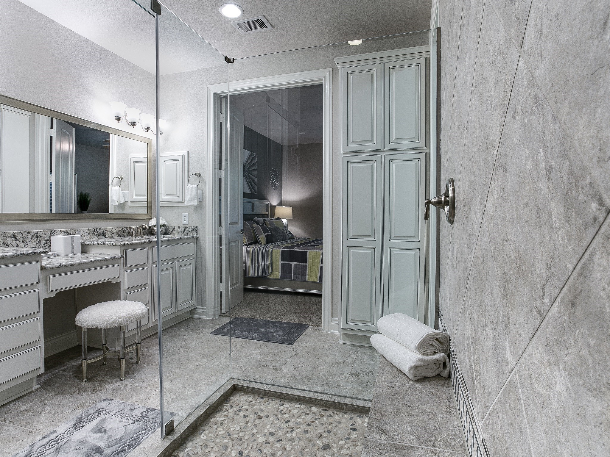 9018 Meacom Drive Conroe, TX 77384 - Photo 25 of 41 a bathroom with a sink a toilet and shower