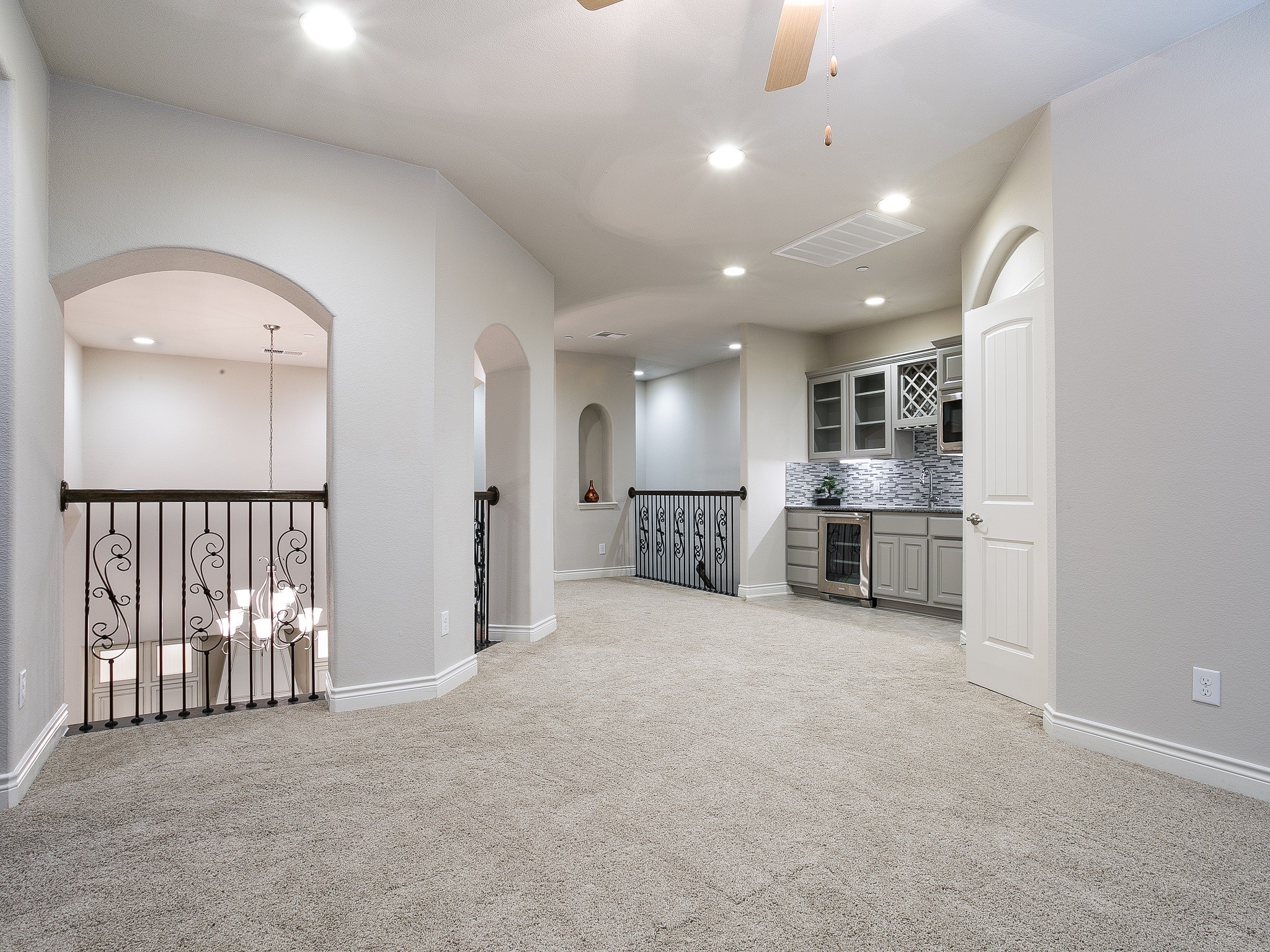 9018 Meacom Drive Conroe, TX 77384 - Photo 32 of 41 a view of a kitchen with refrigerator and a sink