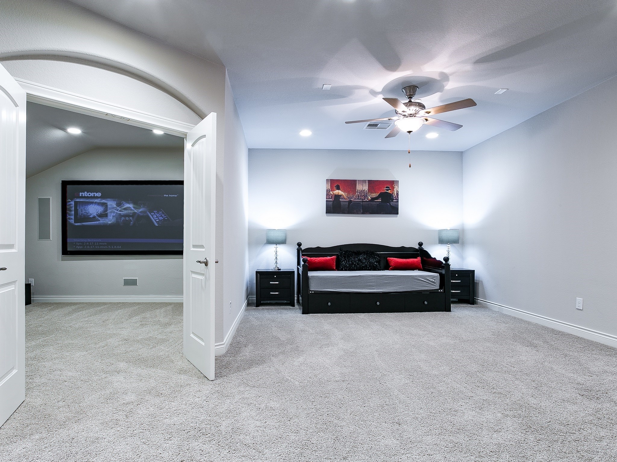 9018 Meacom Drive Conroe, TX 77384 - Photo 35 of 41 a living room with furniture and a flat screen tv