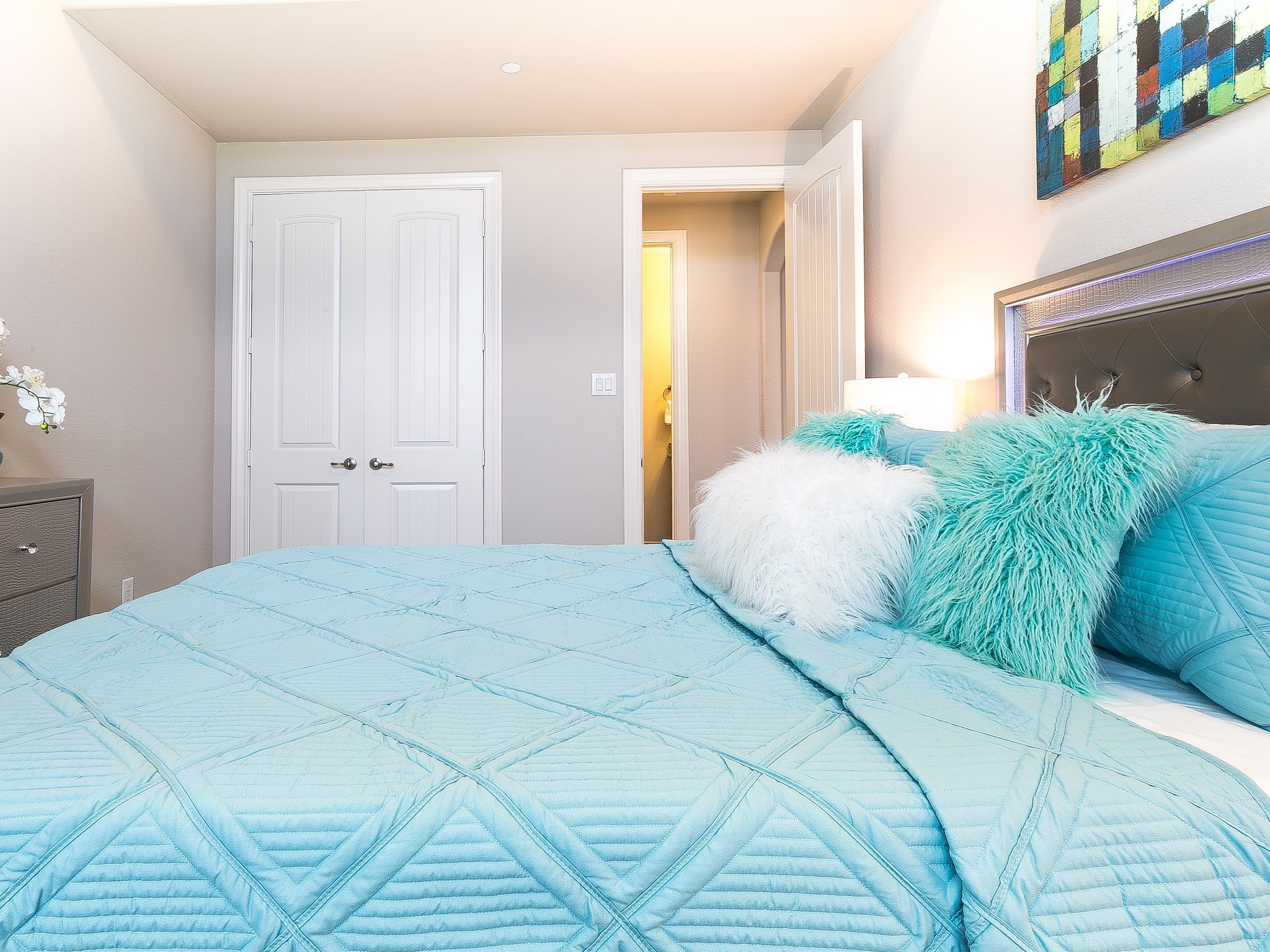 9018 Meacom Drive Conroe, TX 77384 - Photo 6 of 41 a bedroom with a bed and a window