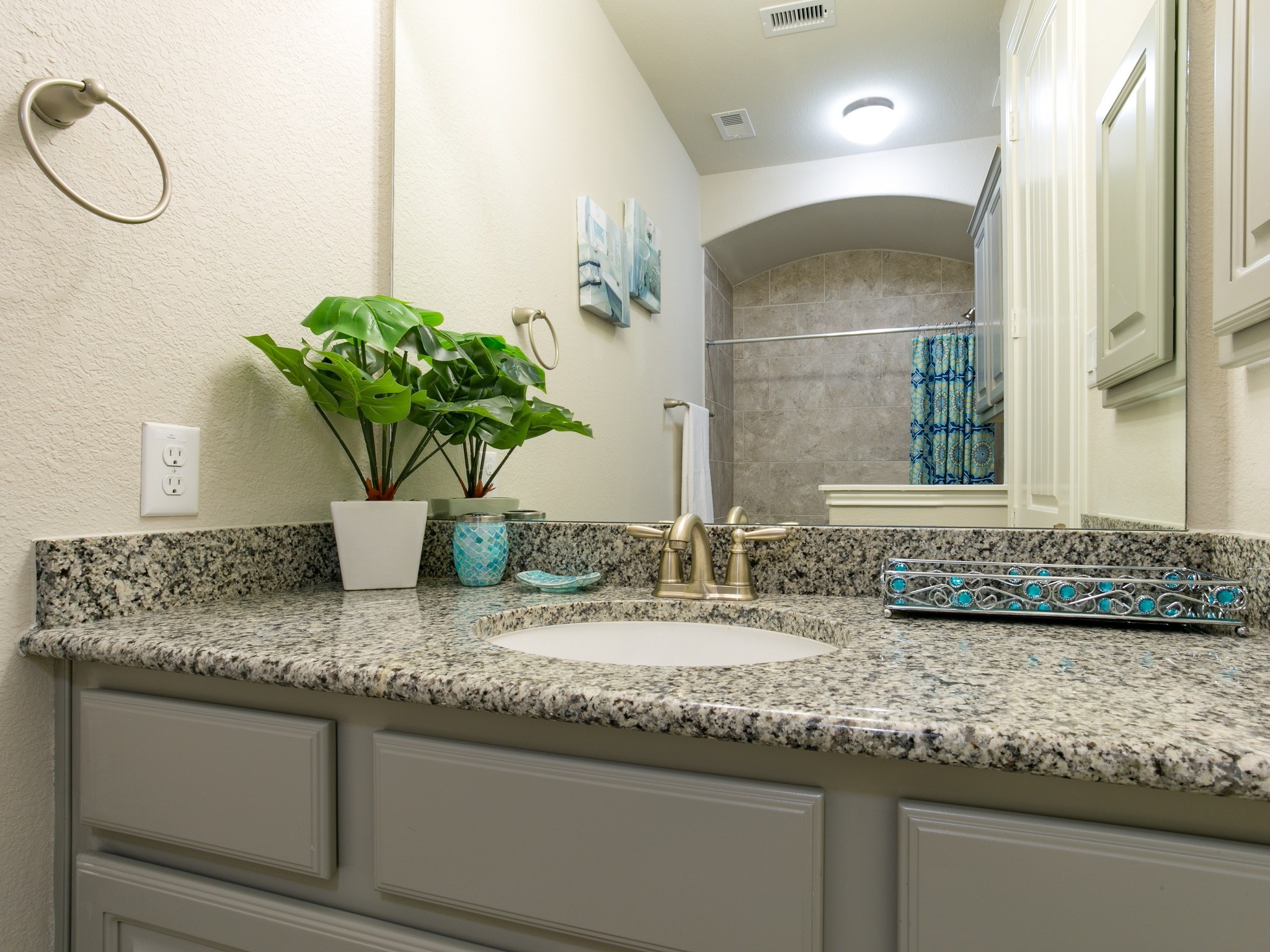 9018 Meacom Drive Conroe, TX 77384 - Photo 7 of 41 a bathroom with sink and mirror
