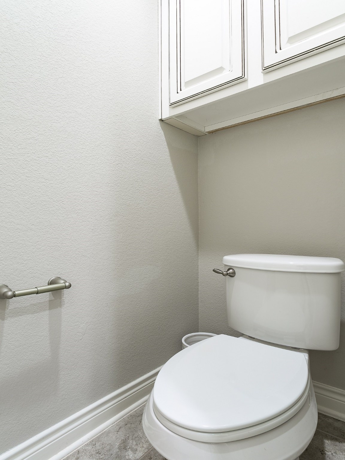 9018 Meacom Drive Conroe, TX 77384 - Photo 8 of 41 a white toilet sitting next to a window
