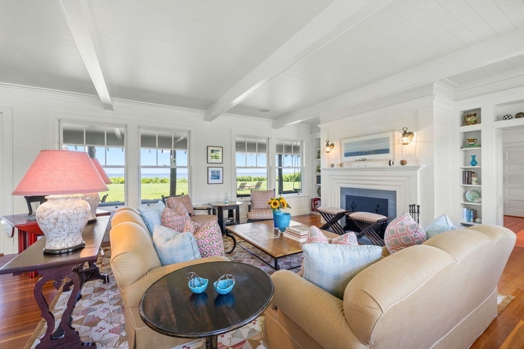 37 North Neck Road Edgartown, MA 02539 - Photo 12 of 40 a living room with furniture and a fireplace