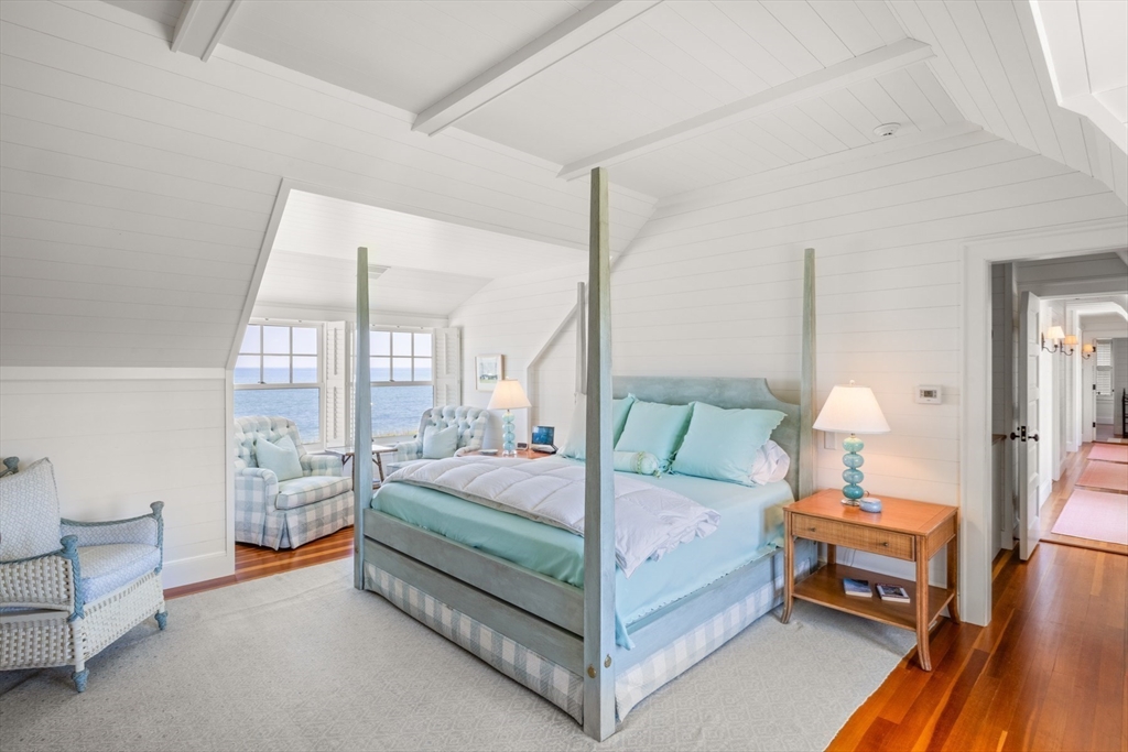 37 North Neck Road Edgartown, MA 02539 - Photo 16 of 40 a bedroom with a bed and large window