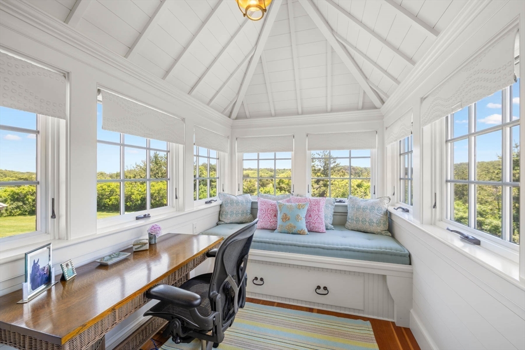 37 North Neck Road Edgartown, MA 02539 - Photo 18 of 40 a living room with furniture and a large window
