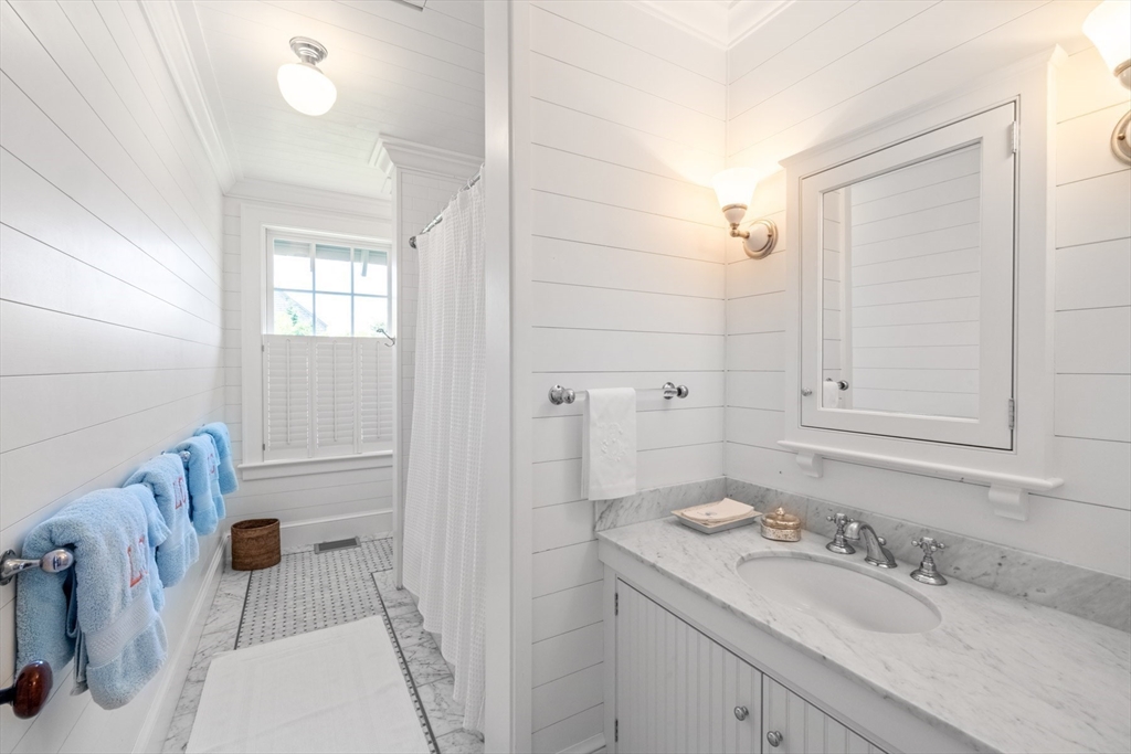 37 North Neck Road Edgartown, MA 02539 - Photo 22 of 40 a bathroom with a sink a toilet and shower