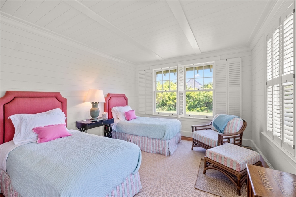 37 North Neck Road Edgartown, MA 02539 - Photo 23 of 40 a bedroom with two beds and a window