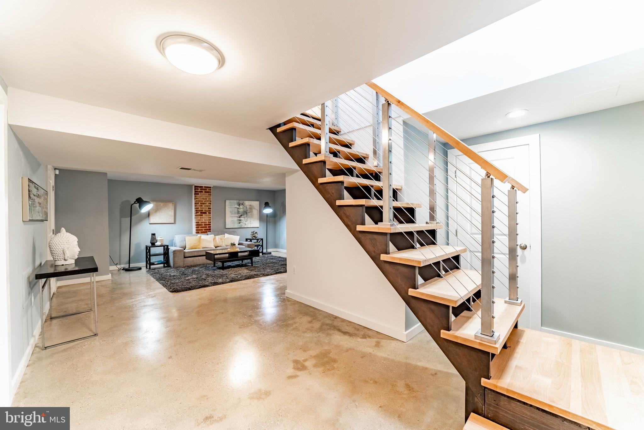 8400 Farrell Drive Chevy Chase, MD 20815 - Photo 19 of 36 Gorgeous open stairway w/sky light to lower level