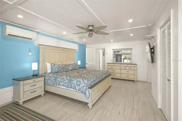 a spacious bathroom with a double vanity sink mirror and bathtub