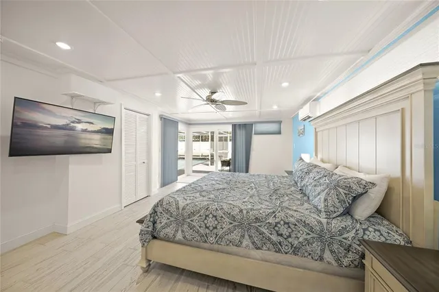 a spacious bathroom with a double vanity sink toilet and shower